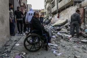 Gazacide. Palestinians inspect a destroyed house after an Israeli air strike, in Rafah in the southern Gaza Strip, on February 27, 2024.