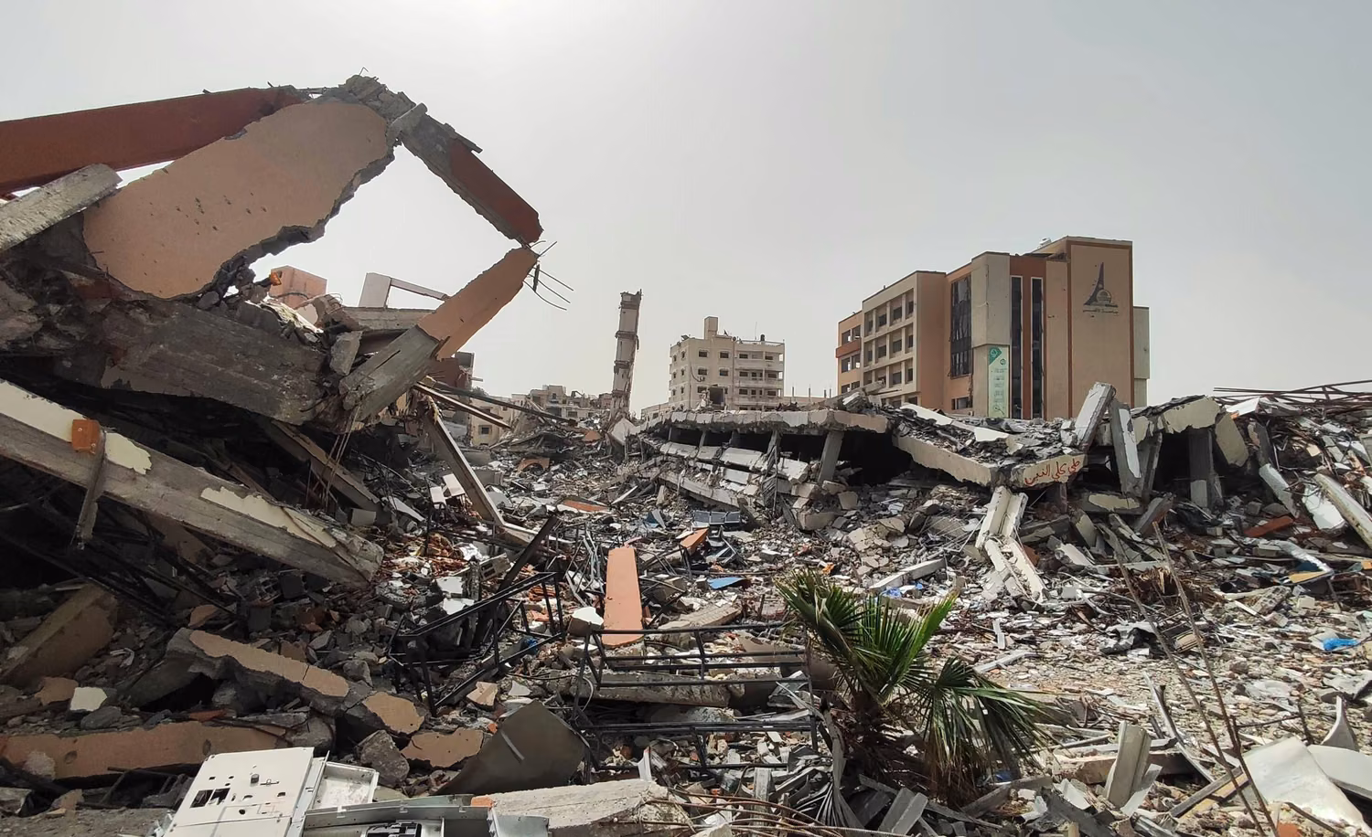 A view of extensive destruction in the Islamic University and residential buildings destroyed during an Israeli raids areas west of Gaza City, in Al-Rimal neighborhood, Gaza on April 18, 2024. Scholasticide in Gaza