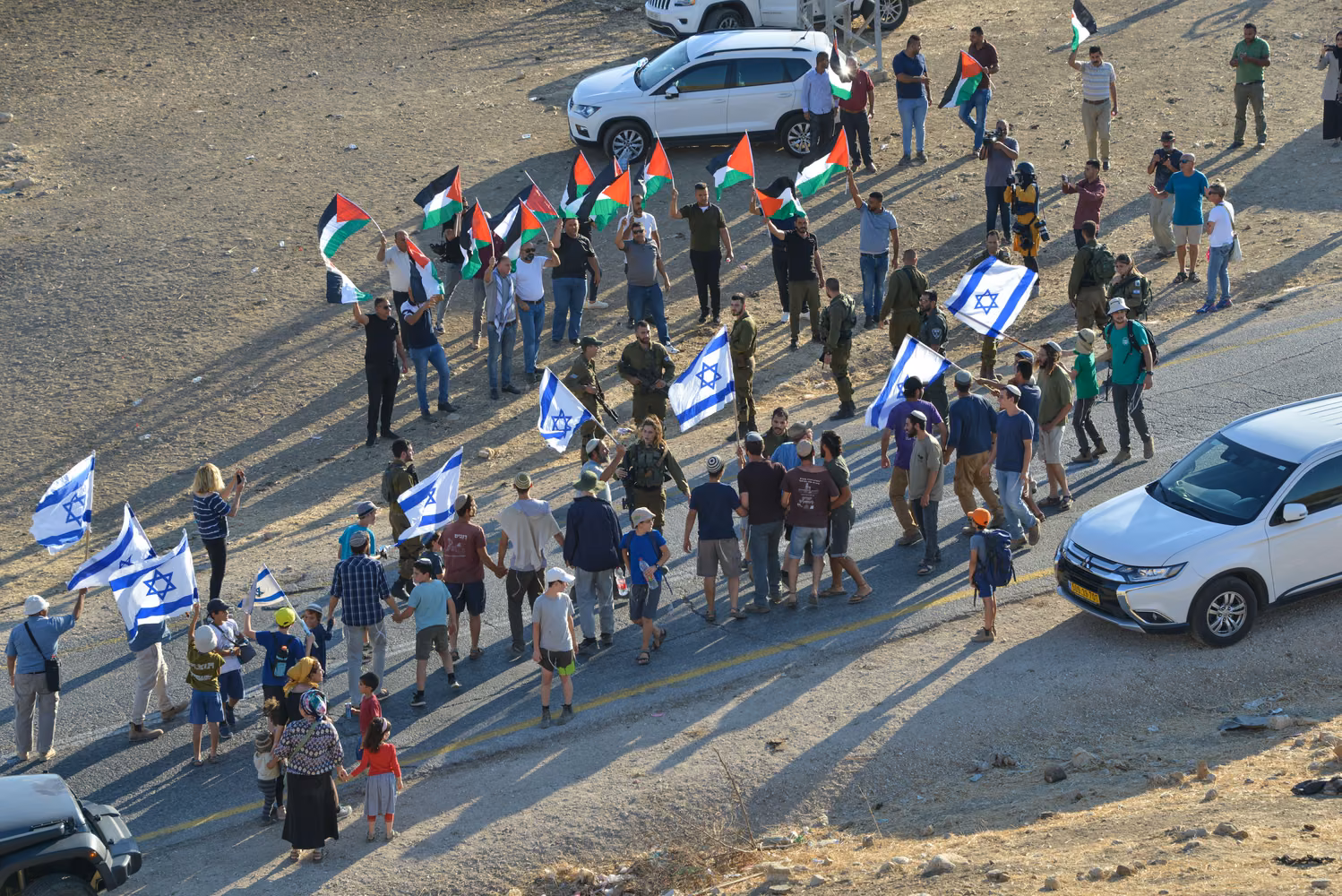 In June 2021, there were 14 simultaneous marches of religious Jewish settlers in the West Bank, against illegal (sic) Arab construction in Area C. This is in Ein Al Hiwe, Jordan Vallet. (Credit: Matan Golan/Alamy Live News)