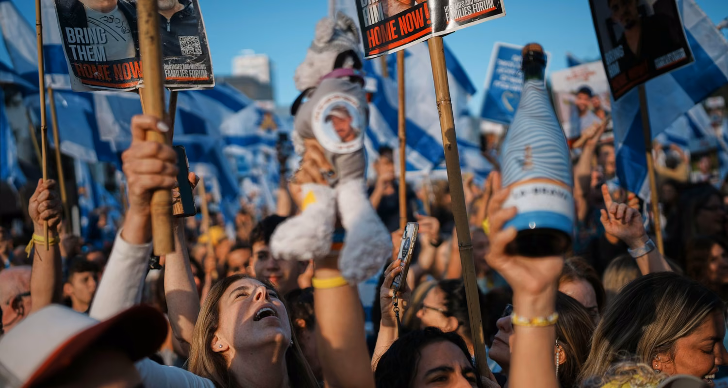 a jubilant crowd of people