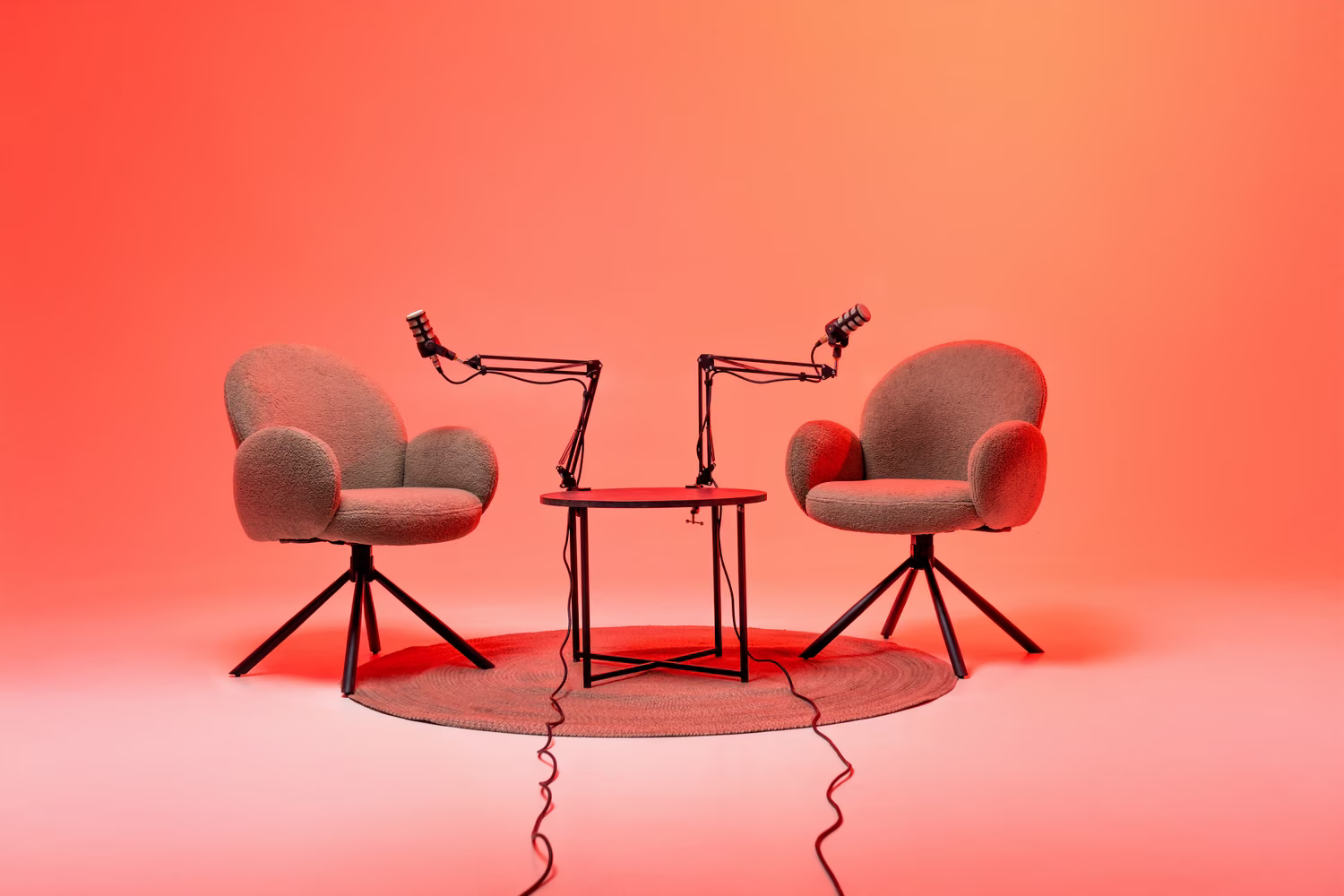 2 chairs and mic ready for a podcast