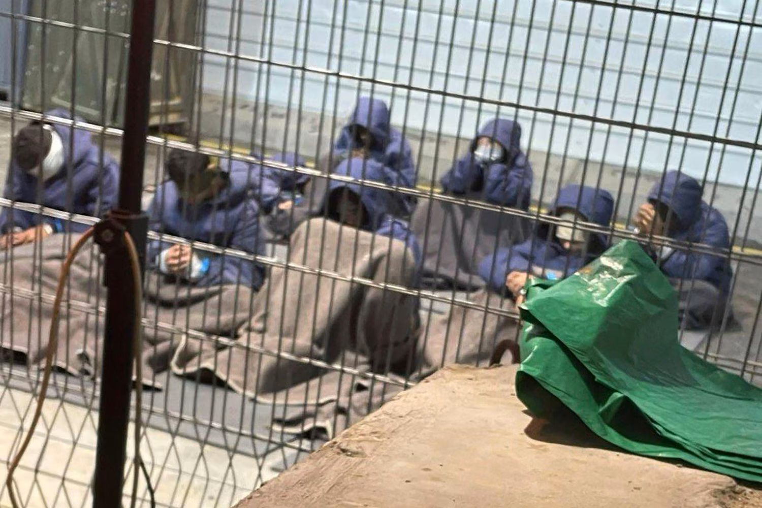 photo from Winter 2023 provided by Breaking The Silence, a whistleblower group of former Israeli soldiers, shows Palestinian prisoners captured in the Gaza Strip by Israeli forces at a detention facility on the Sde Teiman military base in southern Israel.- Lynch Law